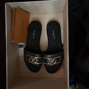 Louis Vuitton Black Leather Lock It Slides Sandals, US 8.5